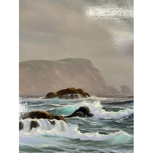 262 - A gilt framed Peter Cosslett (1927 - 2012) oil on canvas of a seascape - approx. 54cm high x 64cm wi... 