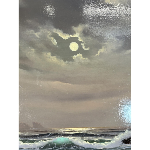 262 - A gilt framed Peter Cosslett (1927 - 2012) oil on canvas of a seascape - approx. 54cm high x 64cm wi... 