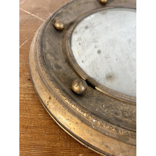 281 - A Regency style gilt metal framed circular convex wall mirror - approx. 39cm diameter