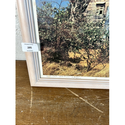 295 - A framed Eleanor Chandler signed limited edition 287 of 300 photograph - approx. 56cm high x 66cm wi... 