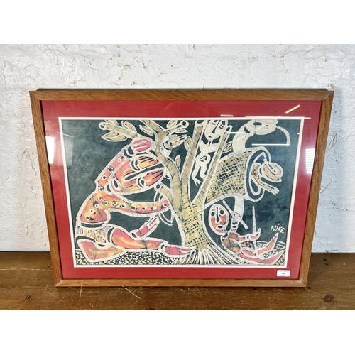 296 - A framed Nike Davies-Okundaye batik - approx. 56cm high x 75cm wide