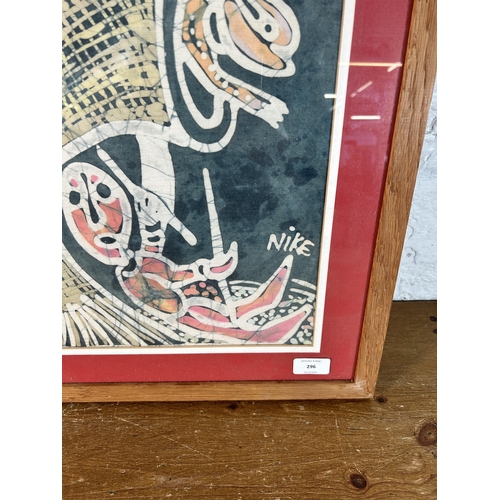 296 - A framed Nike Davies-Okundaye batik - approx. 56cm high x 75cm wide