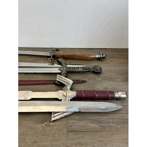 643 - A collection of reproduction swords