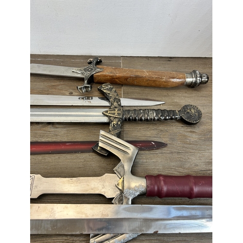 643 - A collection of reproduction swords