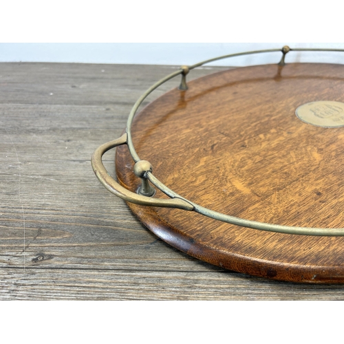 649 - An early 20th century oak and EPNS twin serving tray - approx. 63cm long x 41cm deep