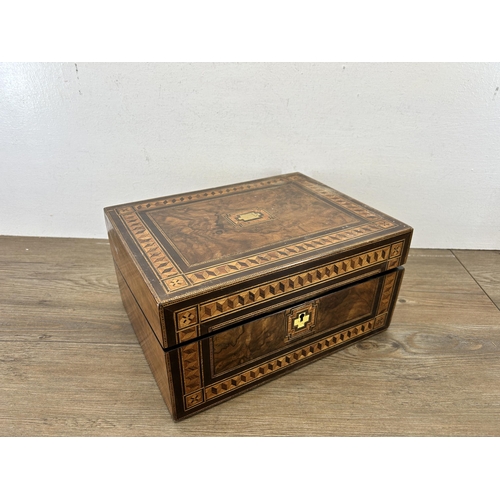 651 - A 19th century burr walnut and marquetry inlaid writing slope with leather insert and inkwell