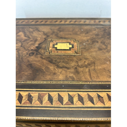 651 - A 19th century burr walnut and marquetry inlaid writing slope with leather insert and inkwell