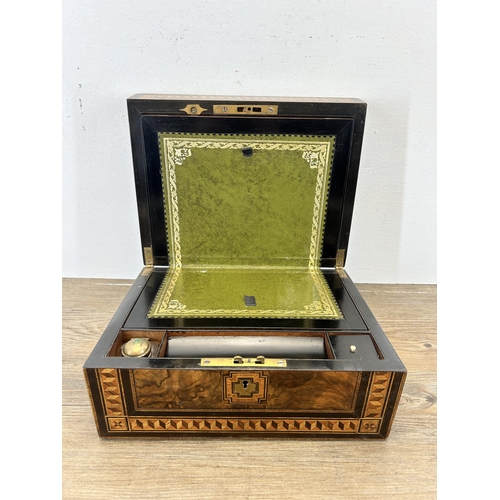 651 - A 19th century burr walnut and marquetry inlaid writing slope with leather insert and inkwell