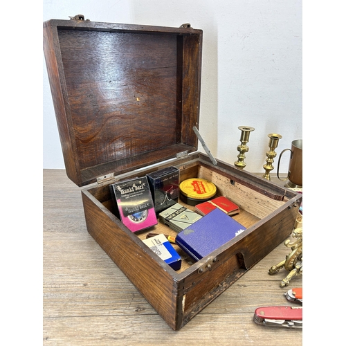 652 - A collection of items to include copper and brassware, Swiss army pocket knife, box set of vintage m... 