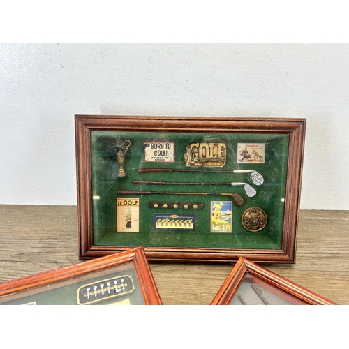 664 - Three cased golfing related items, one trinket box and two wall hangings