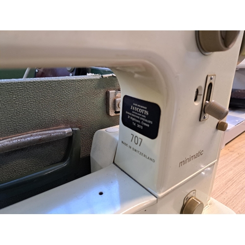 833 - A cased Bernina Minimatic electric sewing machine with foot pedal