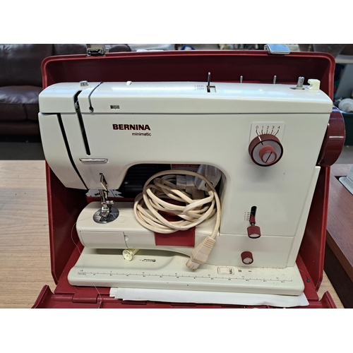 837 - A cased Bernina Minimatic 807 electric sewing machine with foot pedal and attachments