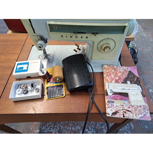 838 - A Singer 507 electric sewing machine with foot pedal, stand, accessories and instruction manual