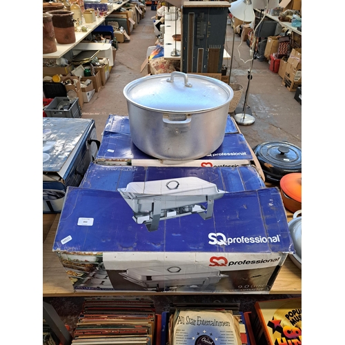 843 - Three items, two boxed SQ Professional 9L single compartment chafing dishes and one large lidded alu... 