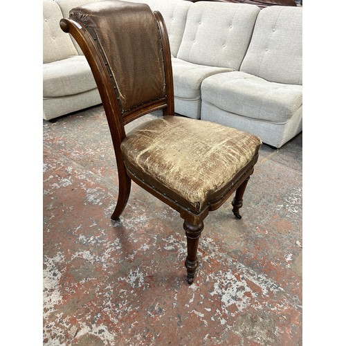 255 - Six 19th century carved oak and brown vinyl upholstered dining chairs