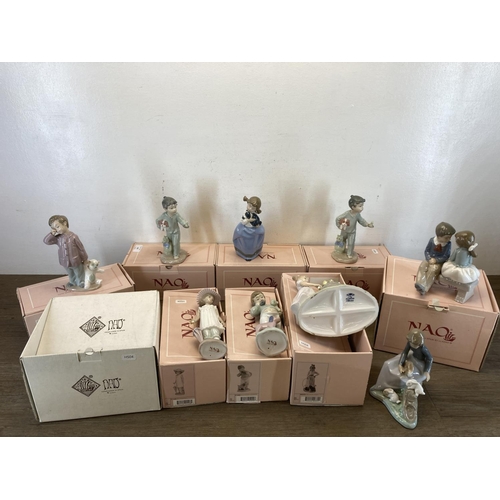 395 - Nine ceramic figurines, eight Nao by Lladro figurines to include 1138, 0379 etc. and one The Leonard... 