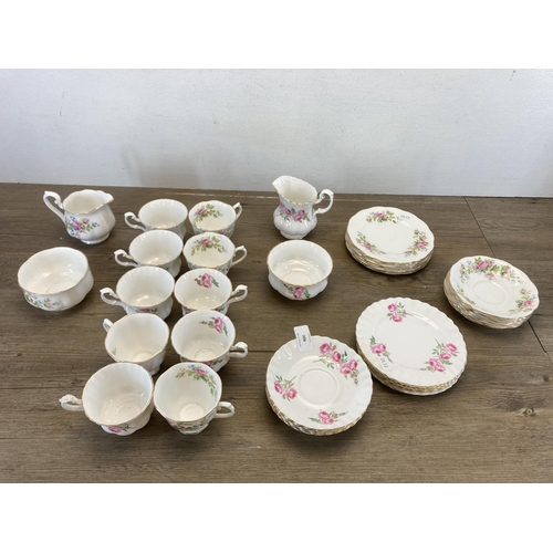 400 - A collection of Royal Albert Moss Rose bone china