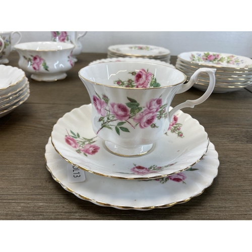 400 - A collection of Royal Albert Moss Rose bone china