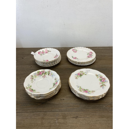 400 - A collection of Royal Albert Moss Rose bone china