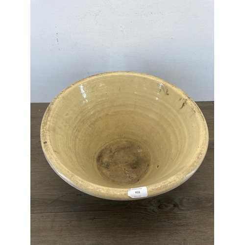 416 - A 19th century salt glazed terracotta dairy bowl - approx. 22cm high x 44cm diameter