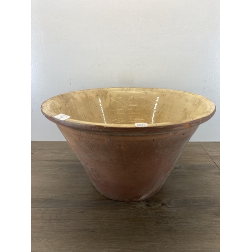 417 - A 19th century salt glazed terracotta dairy bowl - approx. 30cm high x 52cm diameter