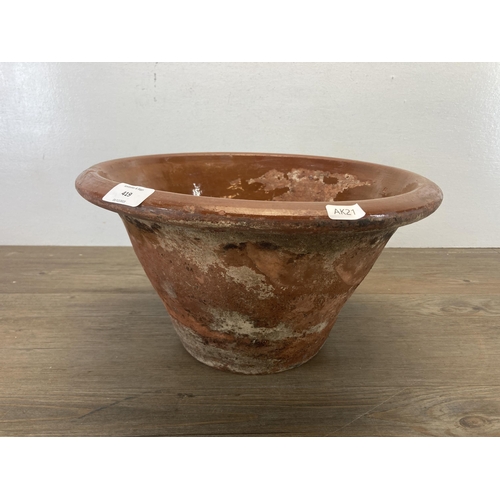 419 - A 19th century salt glazed terracotta dairy bowl - approx. 20cm high x 35cm diameter