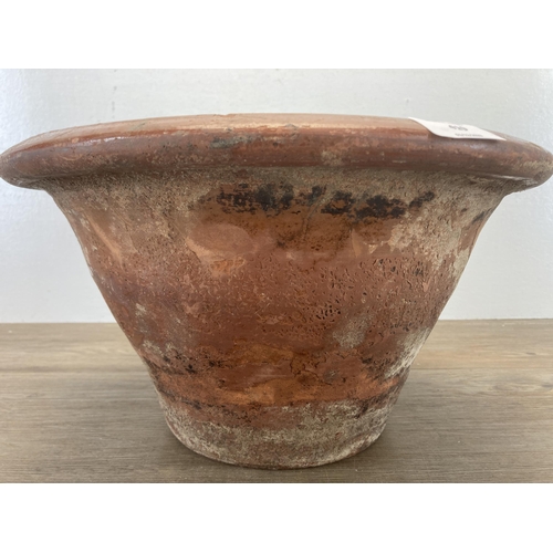 419 - A 19th century salt glazed terracotta dairy bowl - approx. 20cm high x 35cm diameter