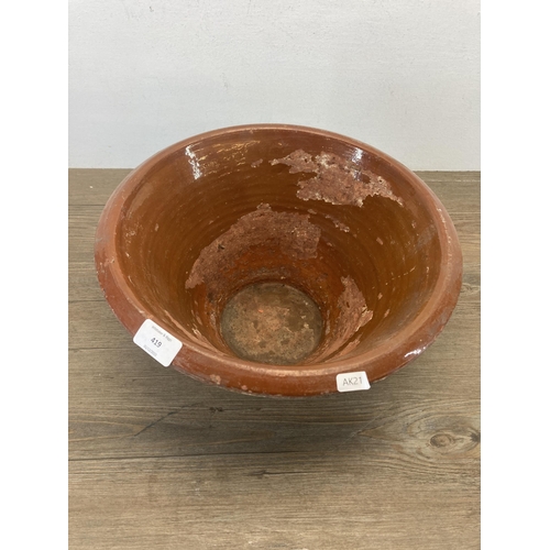 419 - A 19th century salt glazed terracotta dairy bowl - approx. 20cm high x 35cm diameter