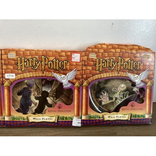 431 - Seven boxed Royal Doulton Harry Potter collector's wall plates