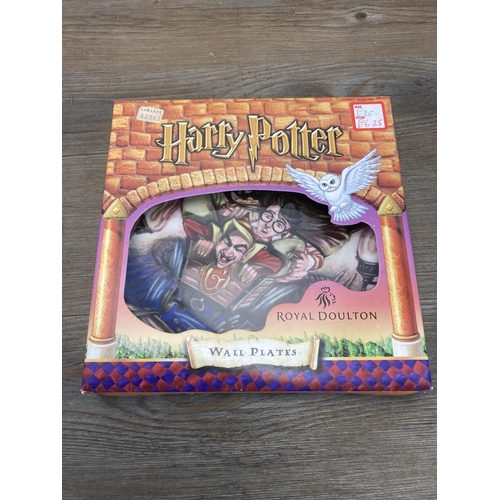 431 - Seven boxed Royal Doulton Harry Potter collector's wall plates