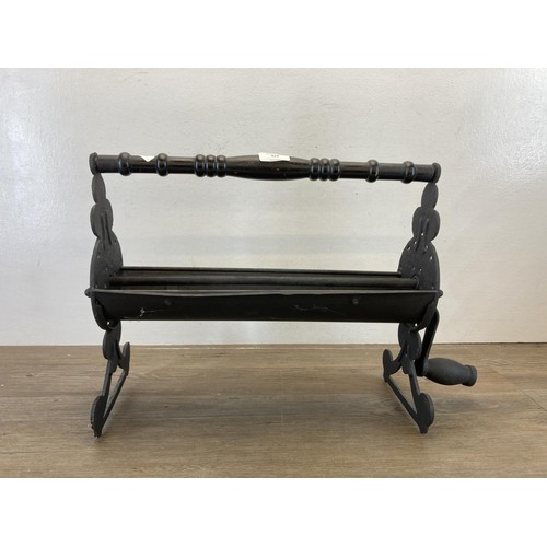 465 - A 19th century style cast metal paper roller - approx. 37cm high x 43cm wide