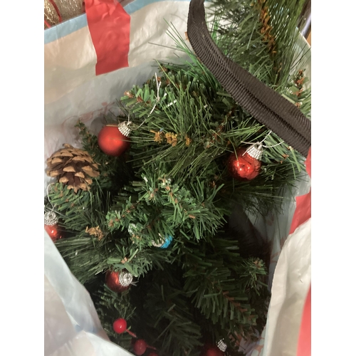 994 - A box and three bags containing Christmas items to include cards, baubles, tinsel, lights etc.