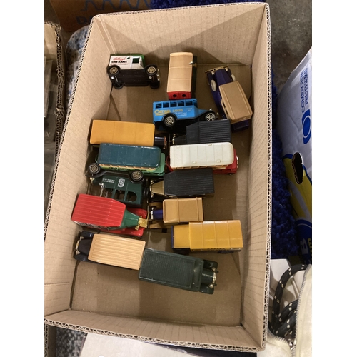 999 - Five boxes containing vintage diecast model vehicles, work trousers with intact tags, vintage board ... 