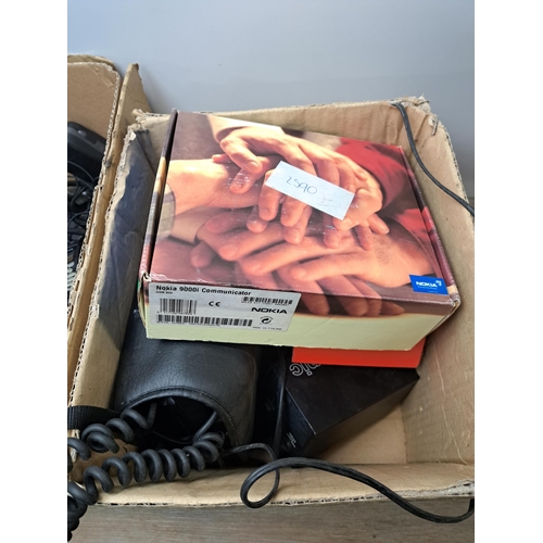 758 - Two boxes containing a large collection of telecom items to include cased Panasonic E-TACS car phone... 