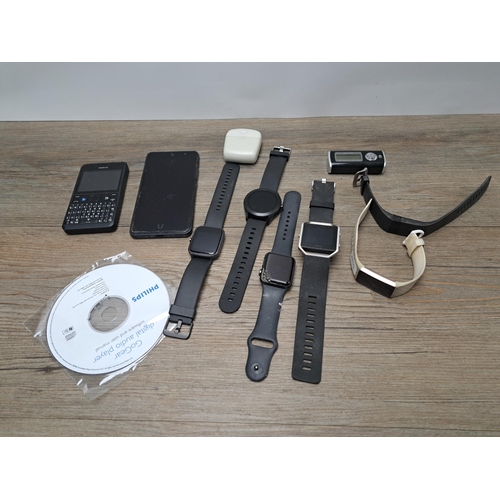 770 - A collection of technology related items to include Apple Watch series 3, Goodmans smart watch, Camb... 