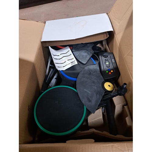 774 - Three Guitar Hero items, boxed Microsoft Xbox 360 Guitar Hero World Tour drum controller, boxed Xbox... 