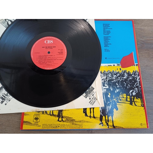 796 - Seven The Clash and related LP vinyl records, 'Combat Rock', 'Sandanista!' (3LP with insert), 'The C... 