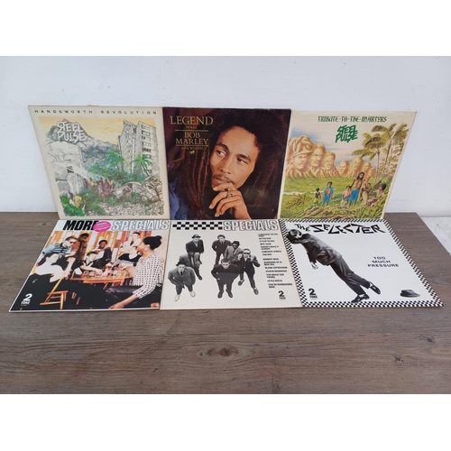 804 - Six reggae and 2 Tone LP vinyl records, two Steel Pulse, two The Specials, The Selecter and Bob Marl... 