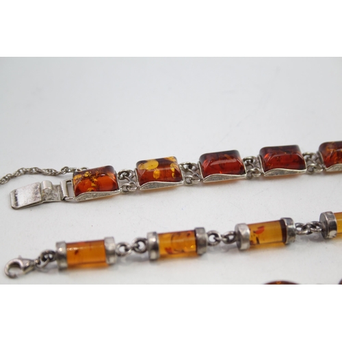 2137 - Three silver Baltic amber set bracelets - approx. gross weight 57g