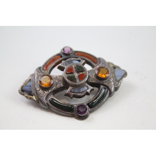 2139 - Two Victorian silver Scottish revival brooches to include bloodstone, carnelian etc. - approx. gross... 