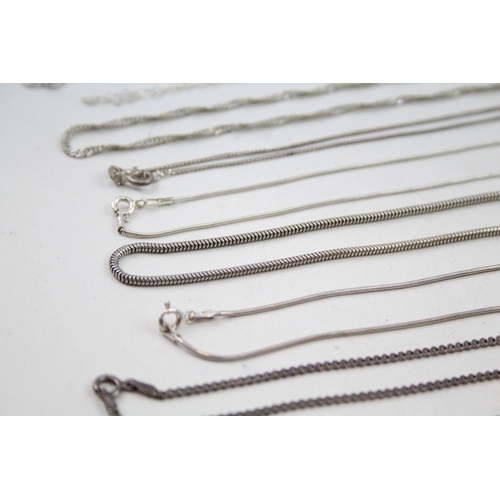 2143 - Twelve silver chain necklaces - approx. gross weight 49g