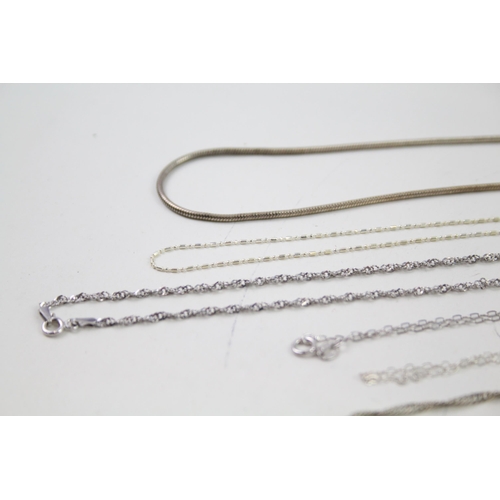 2143 - Twelve silver chain necklaces - approx. gross weight 49g