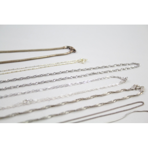 2143 - Twelve silver chain necklaces - approx. gross weight 49g