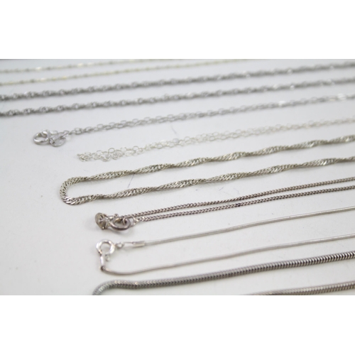 2143 - Twelve silver chain necklaces - approx. gross weight 49g