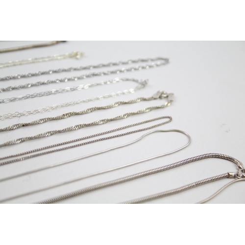 2143 - Twelve silver chain necklaces - approx. gross weight 49g