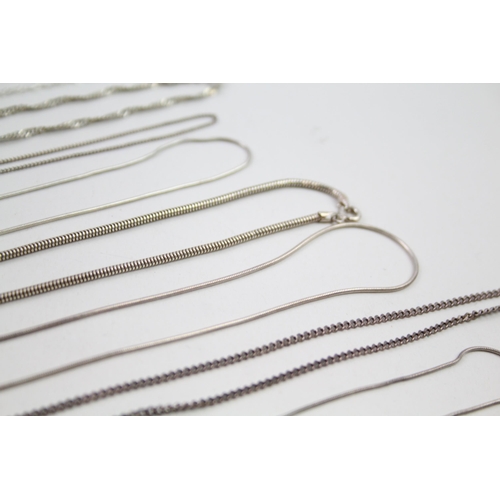 2143 - Twelve silver chain necklaces - approx. gross weight 49g