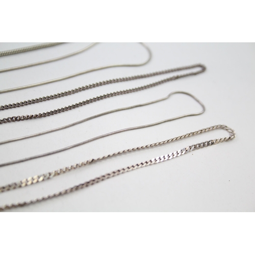 2143 - Twelve silver chain necklaces - approx. gross weight 49g