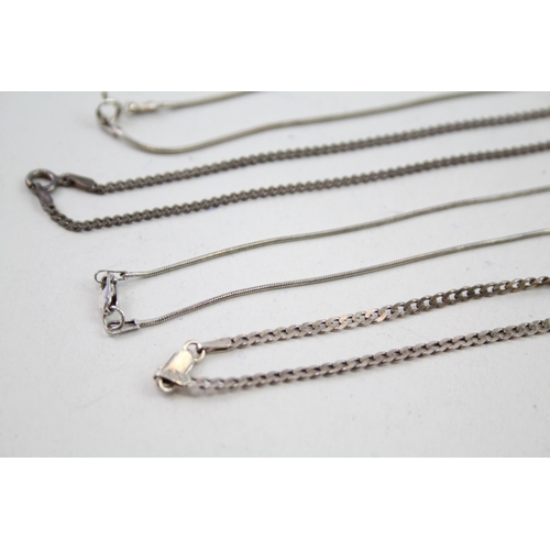 2143 - Twelve silver chain necklaces - approx. gross weight 49g