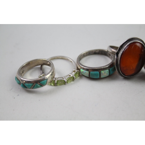 2151 - Eight silver gemstone set rings to include peridot, opal, tanzanite etc. - approx. gross weight 35g