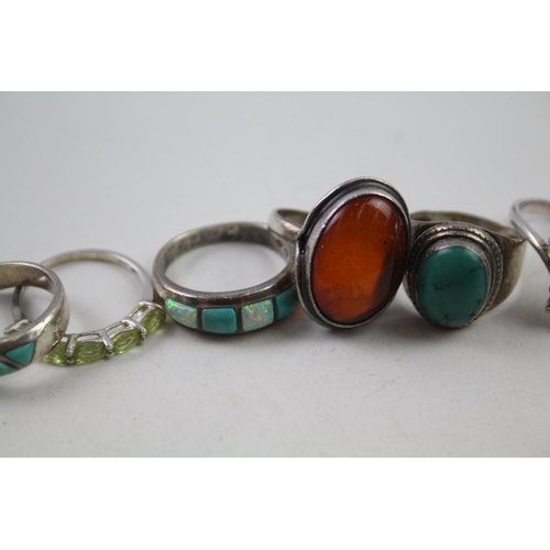 2151 - Eight silver gemstone set rings to include peridot, opal, tanzanite etc. - approx. gross weight 35g